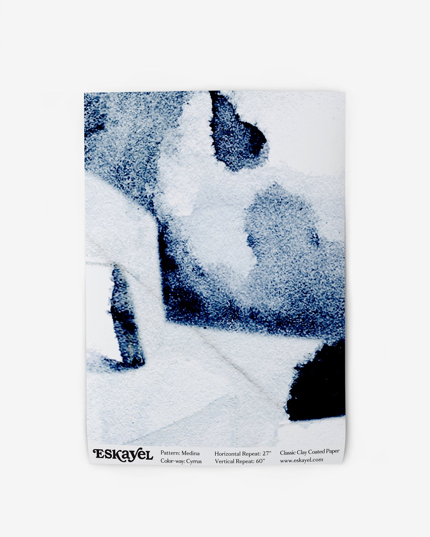 A blue and white Medina Wallpaper Sample on wallpaper is available on wallpaper