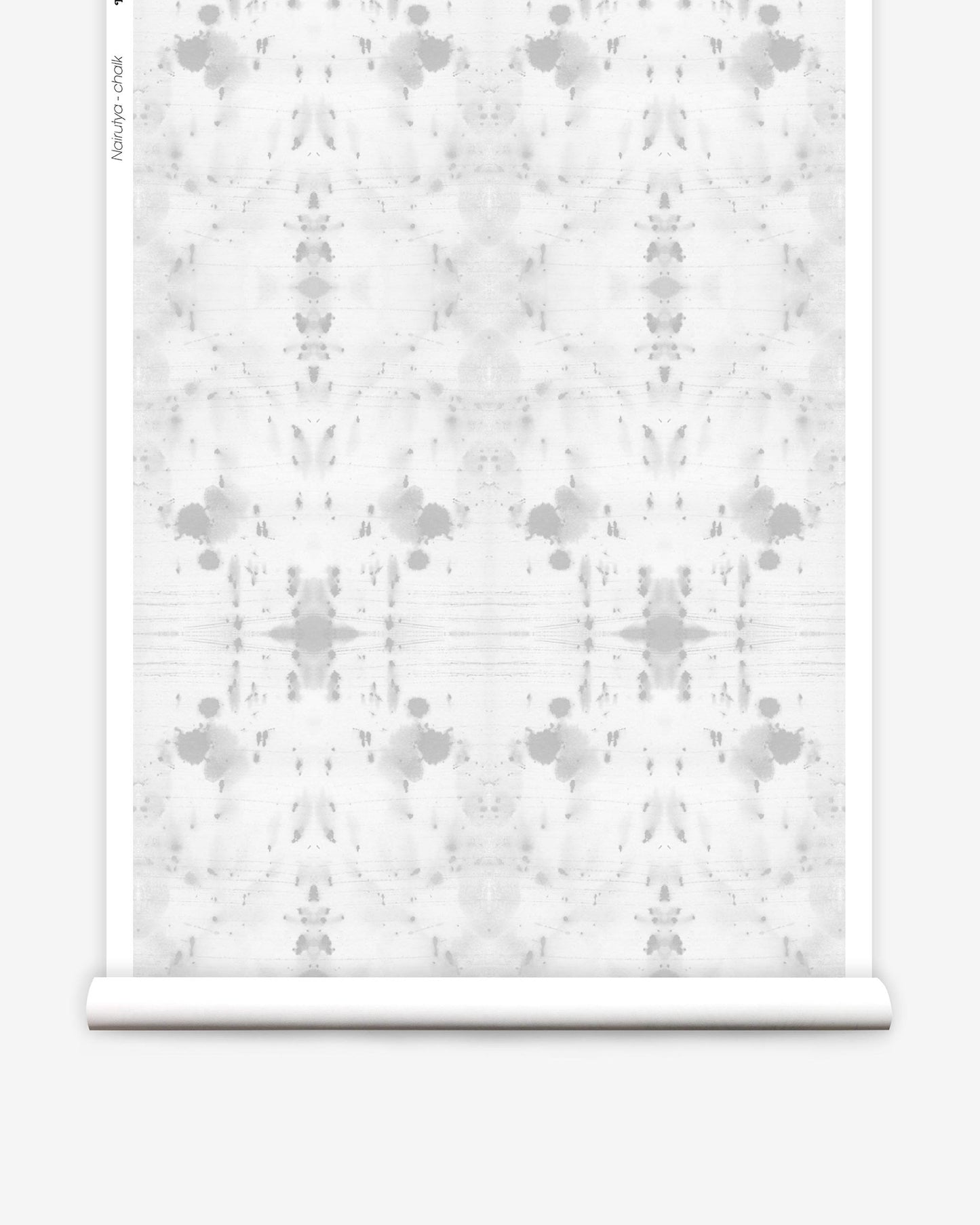 A roll of Nairutya Wallpaper with a white pattern on it