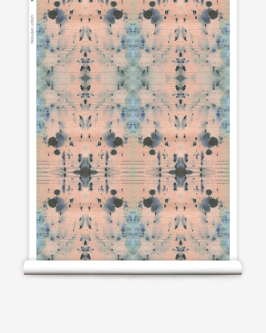 A luxurious and Nairutya Wallpaper Citron from the Jangala Collection, featuring a pink and blue patterned design, on a roll