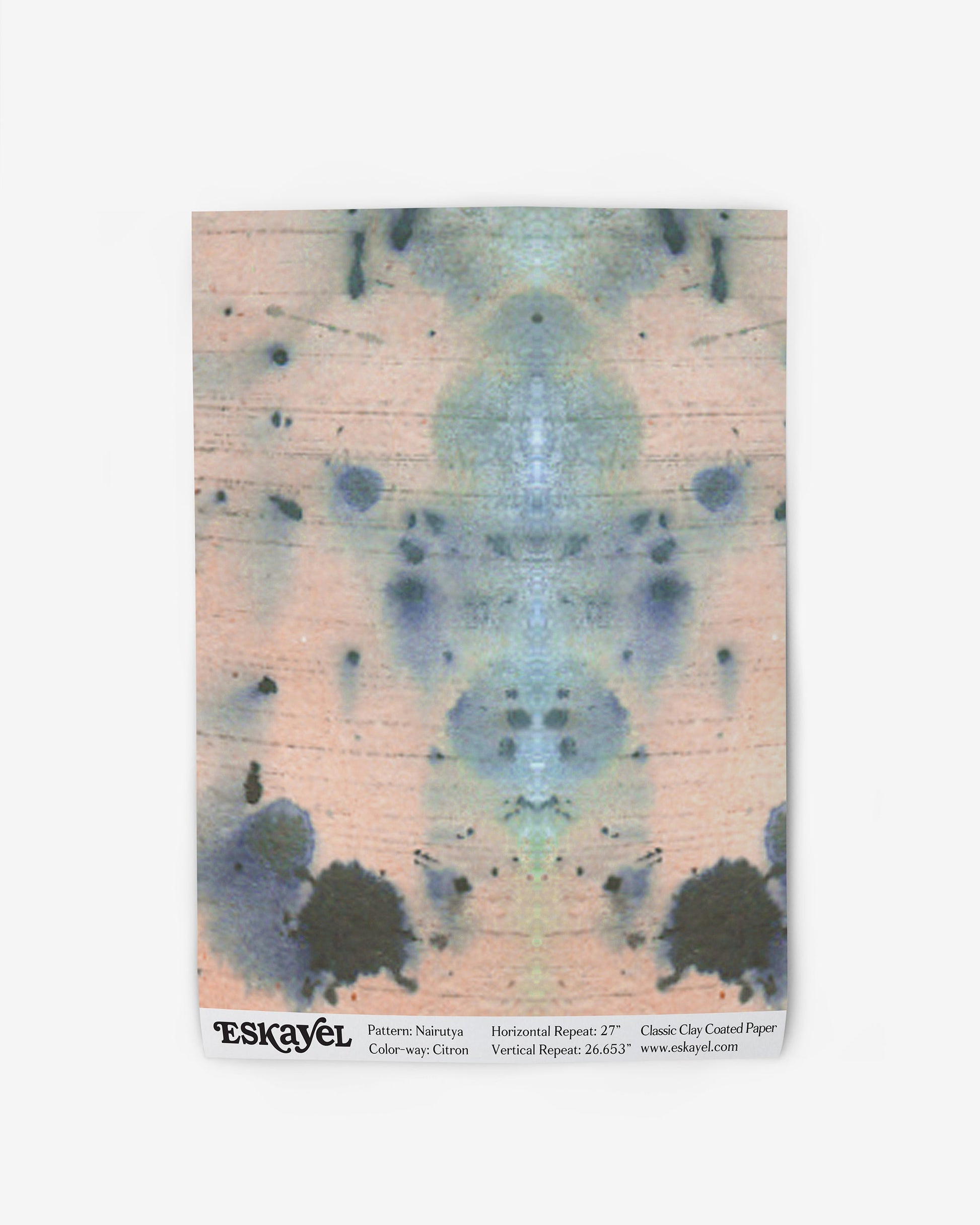 a sample of the Nairutya Wallpaper Sample Citron with an abstract pattern on it