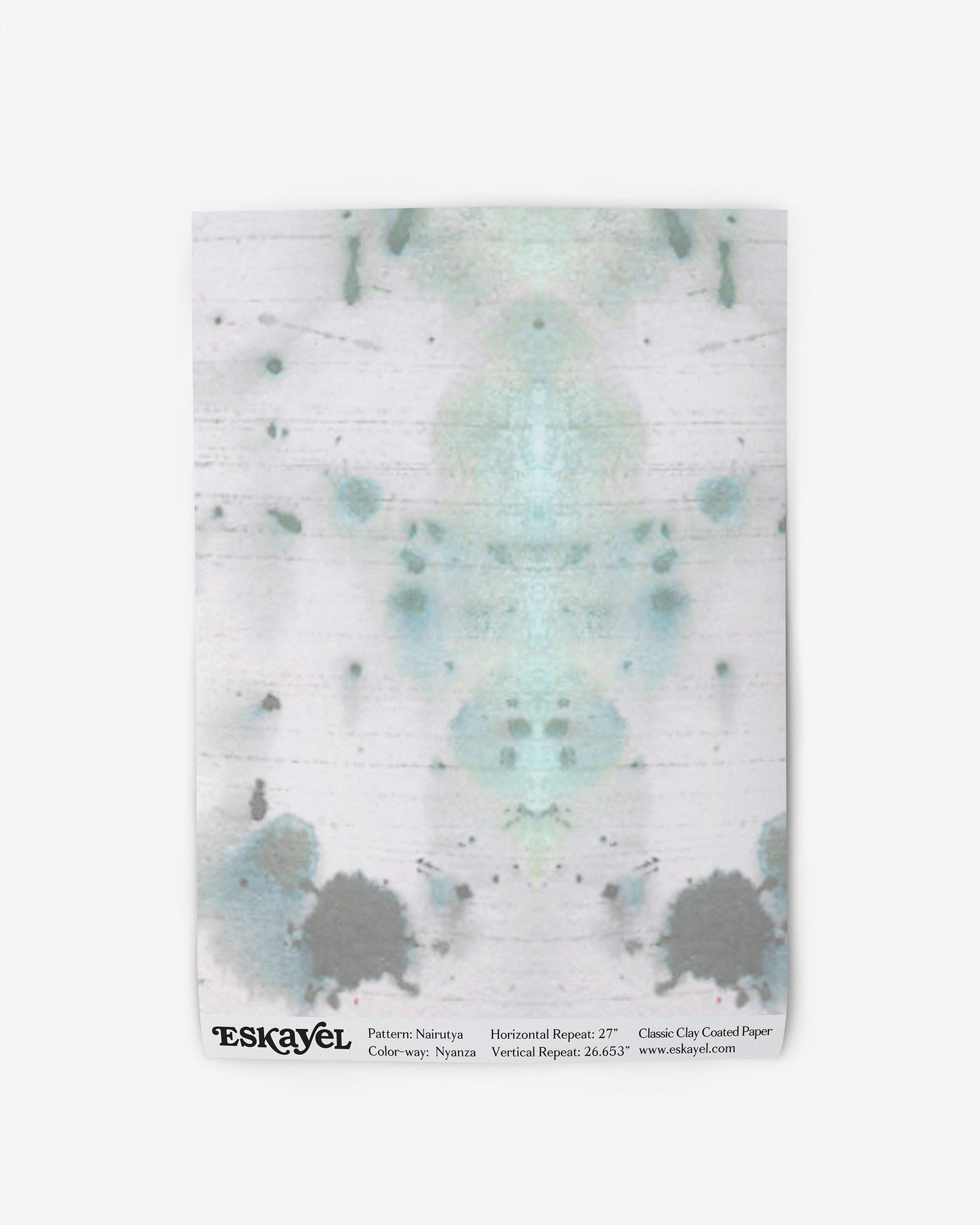 A Nairutya Wallpaper Sample Nyanza with a blue and green splatter on it