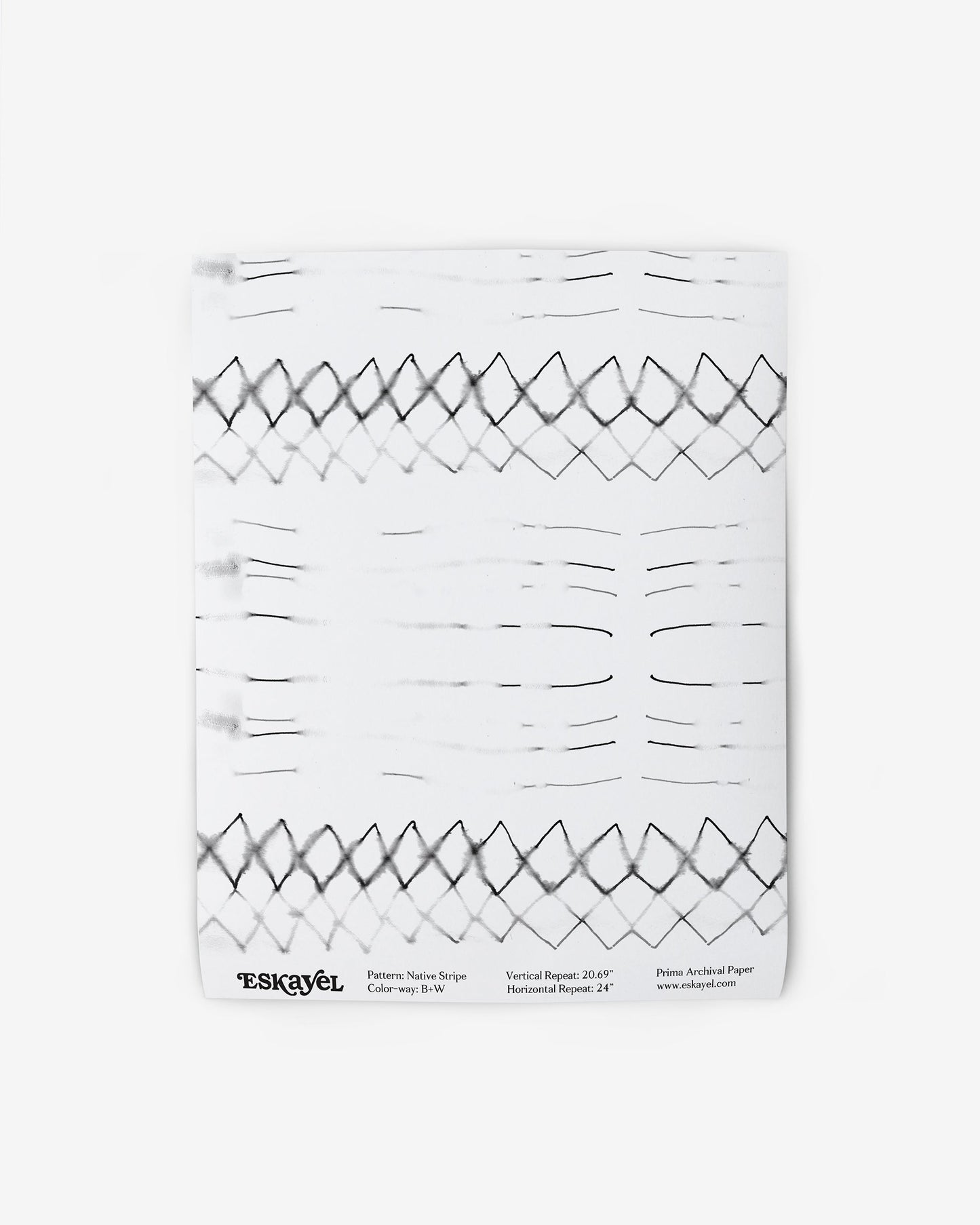 A Native Stripe Wallpaper Black + White with a graphic pattern inspired by Native American textiles