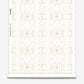 A roll of Omaha Kinship Wallpaper Flax with a white and gold Omaha Kinship pattern