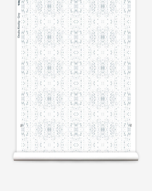 A roll of white paper with an Omaha Kinship Wallpaper Grey pattern on it