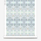 A roll of Parvati Wallpaper from the Dea Collection with a blue and white Parvati pattern on it