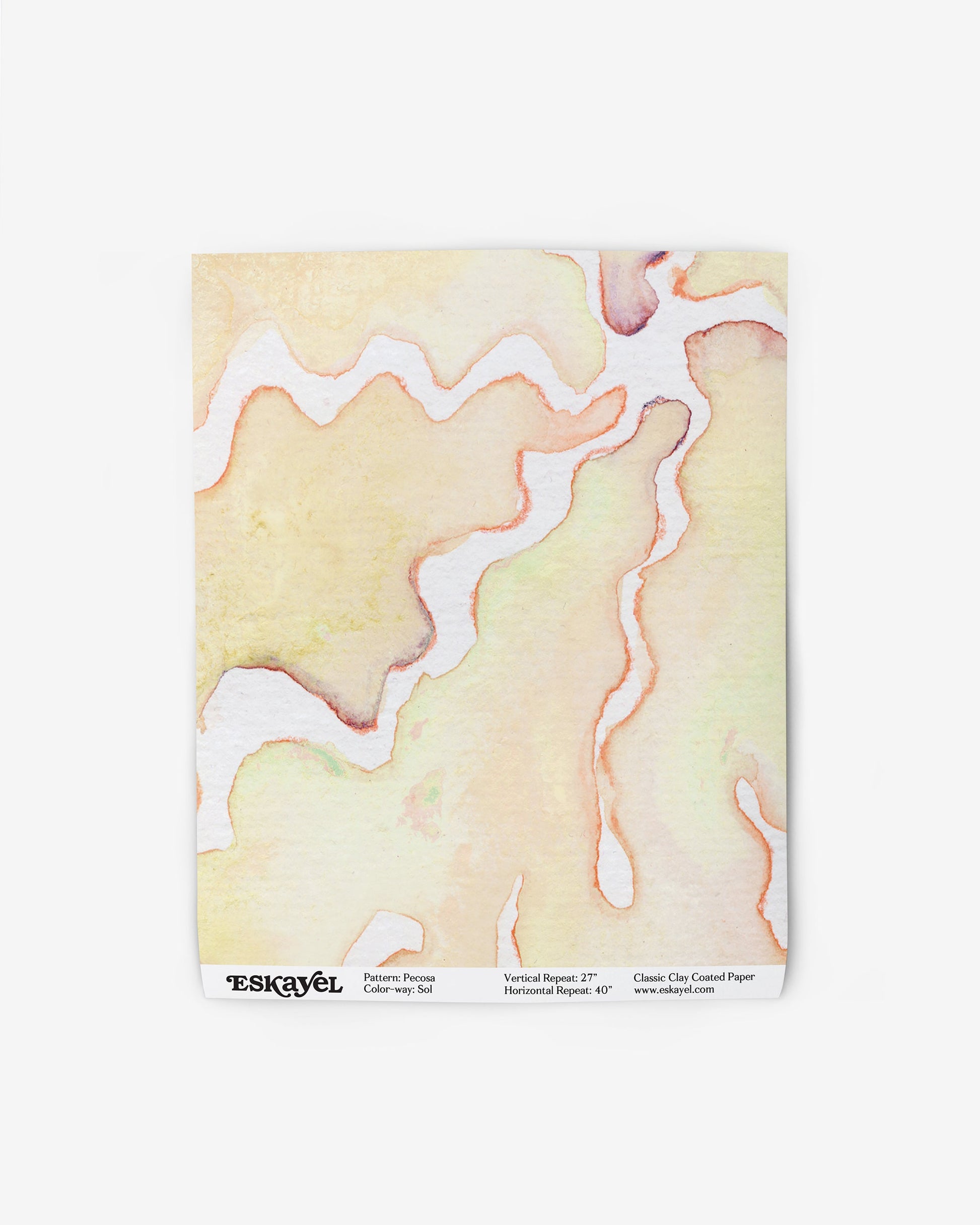 A yellow and orange Pecosa Wallpaper Sol on wallpaper showcasing resist dye techniqueson wallpaper