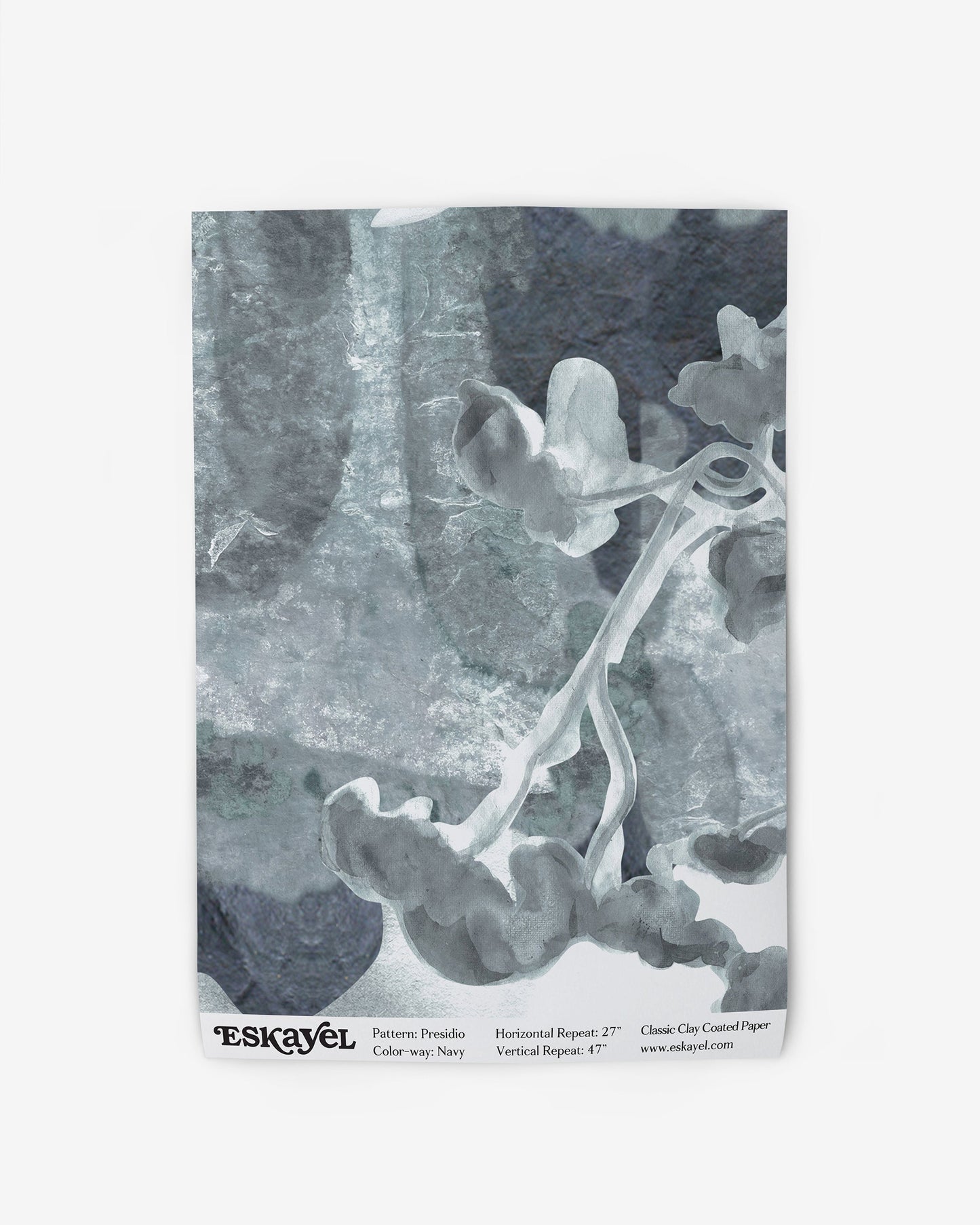 I would like to a sample of a Presidio Wallpaper Sample Navy with a flower on it