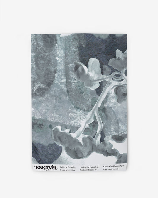I would like to a sample of a Presidio Wallpaper Sample Navy with a flower on it