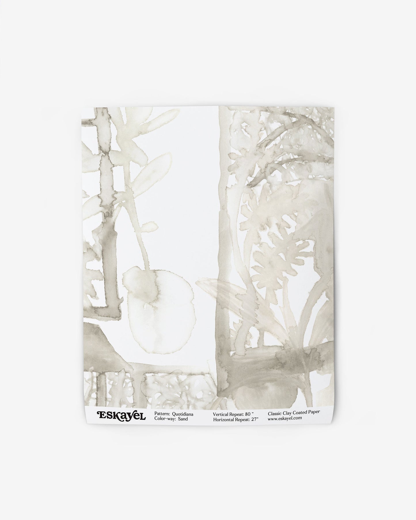 A white piece of Quotidiana Wallpaper Sand with a watercolor painting on it