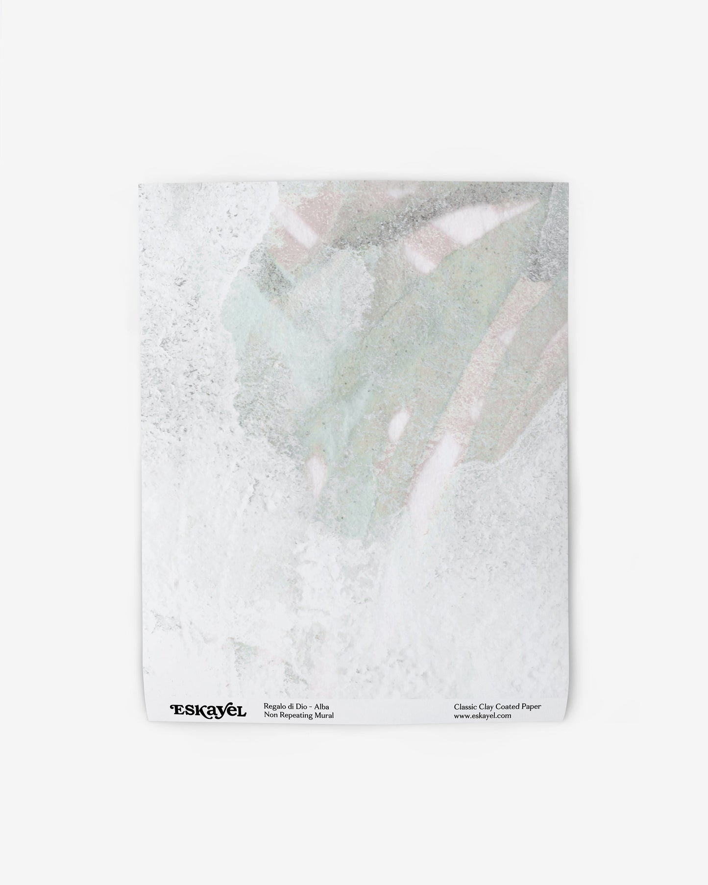 A white wallpaper with the Regalo di Dio Wallpaper Mural Alba design on it