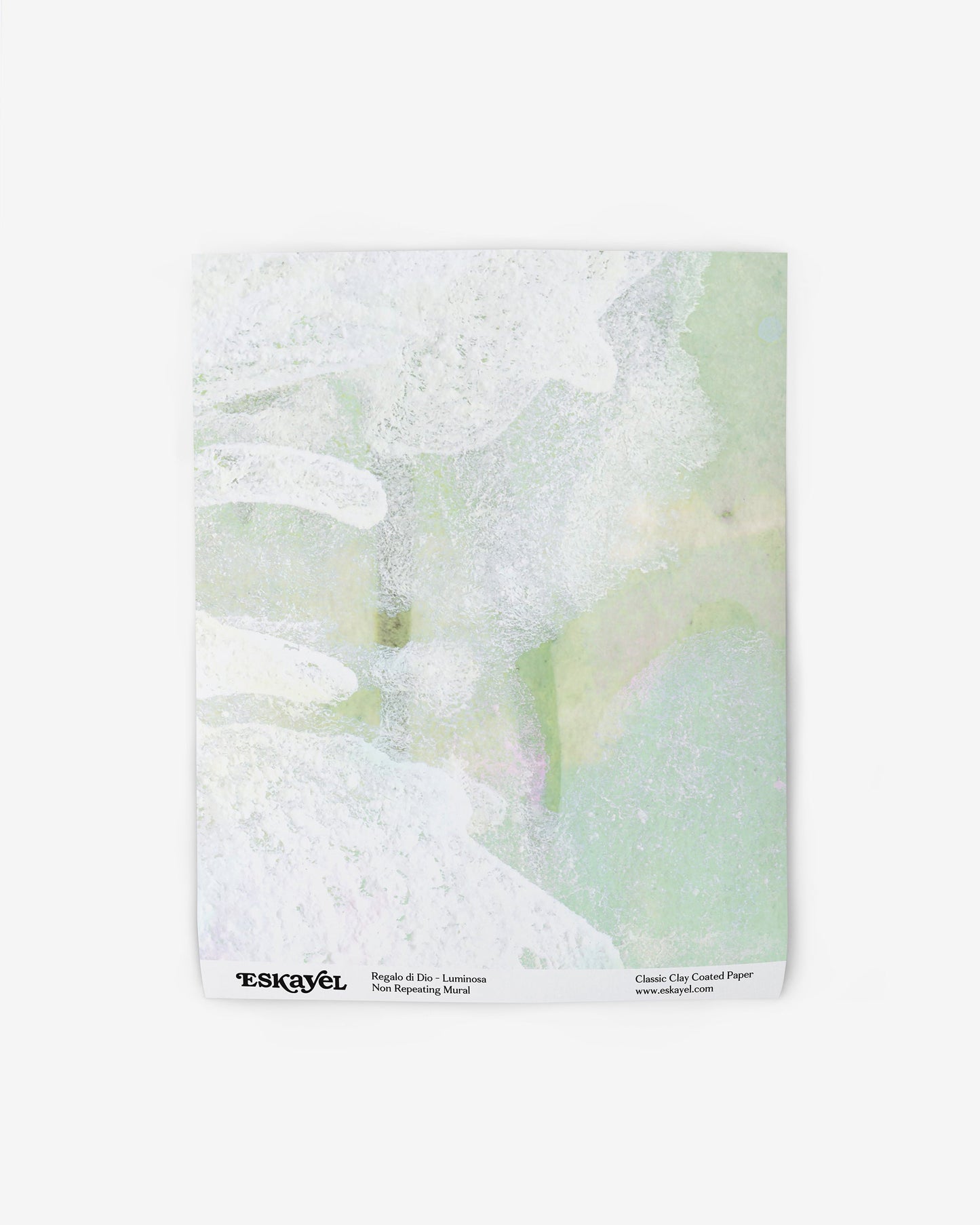 A green and white Regalo di Dio Wallpaper Mural Luminosa with a flower on it in different colorways