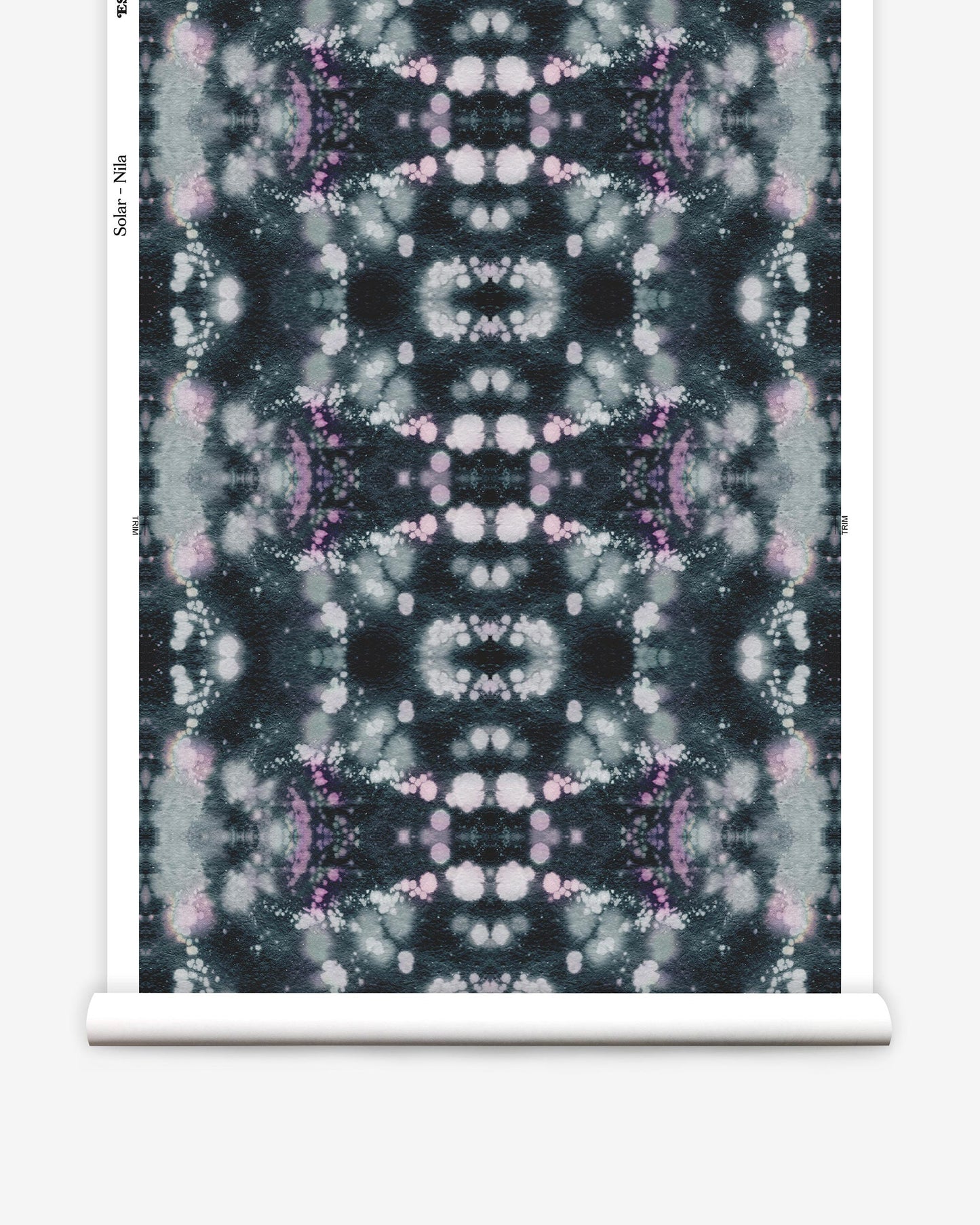 A black and purple tie dye pattern on a roll of Solar Wallpaper Nila paper