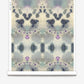 A roll of Species Wallpaper with a kaleidoscopic effect of blue and purple flowers on it