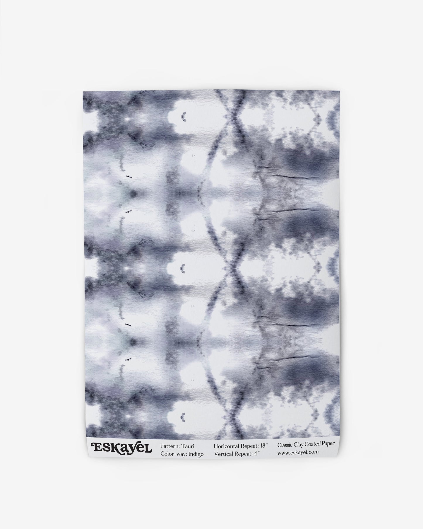 A grey and white tie dye pattern on a Tauri Wallpaper Indigo background