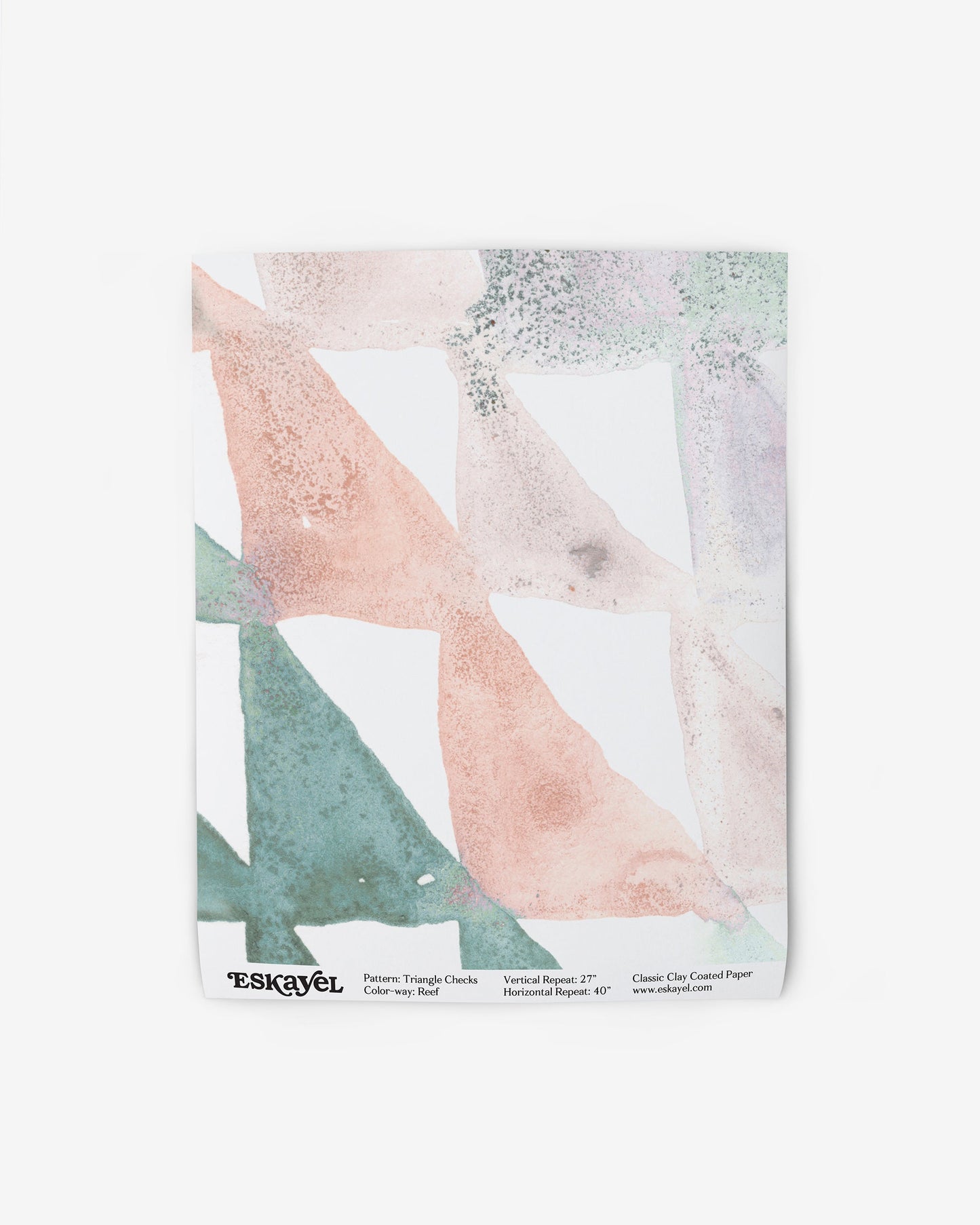 A white Triangle Checks Wallpaper Reef with a pink, green, and blue pattern