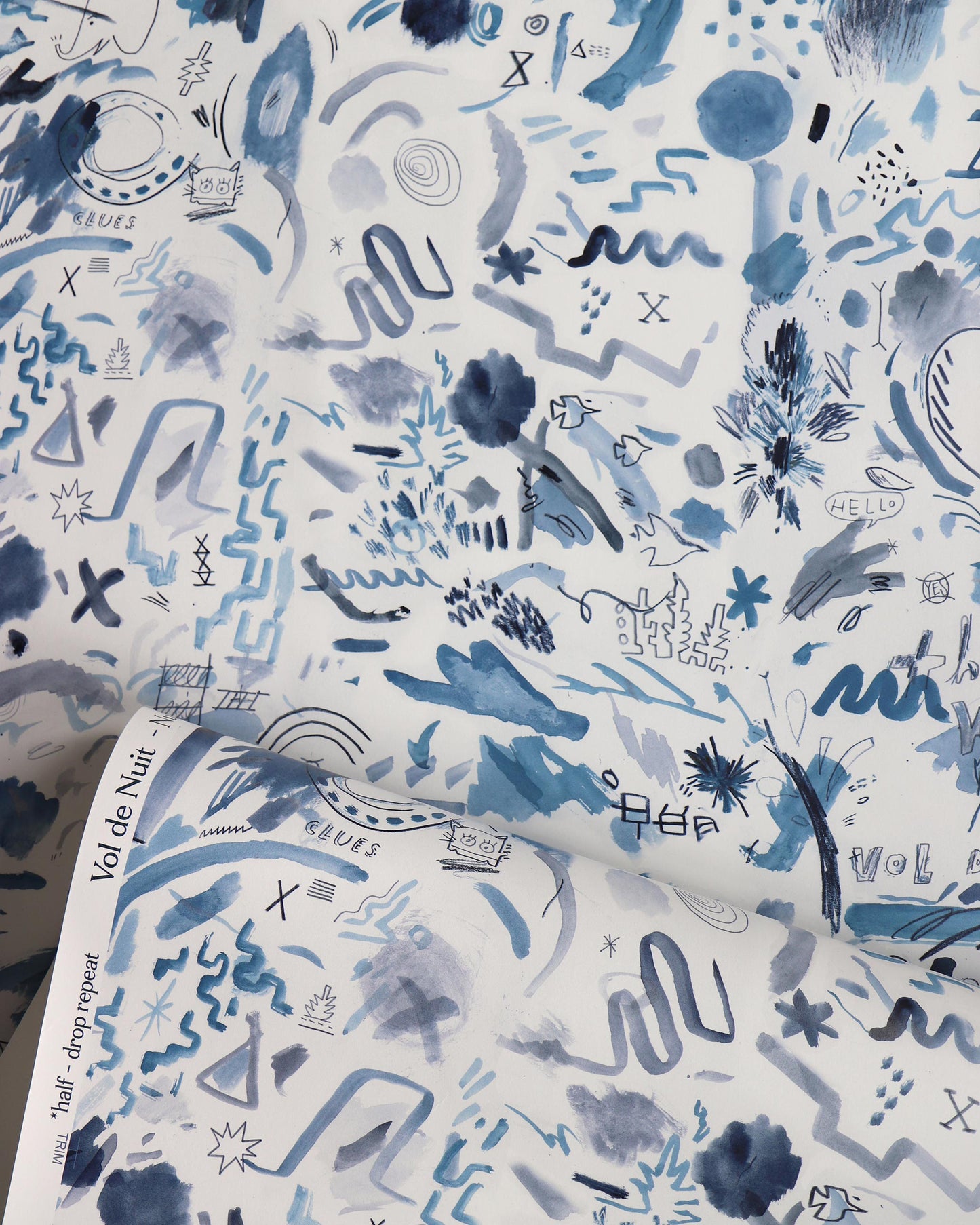 A Vol de Nuit Wallpaper with blue and white designs on high-end luxury fabric grounds