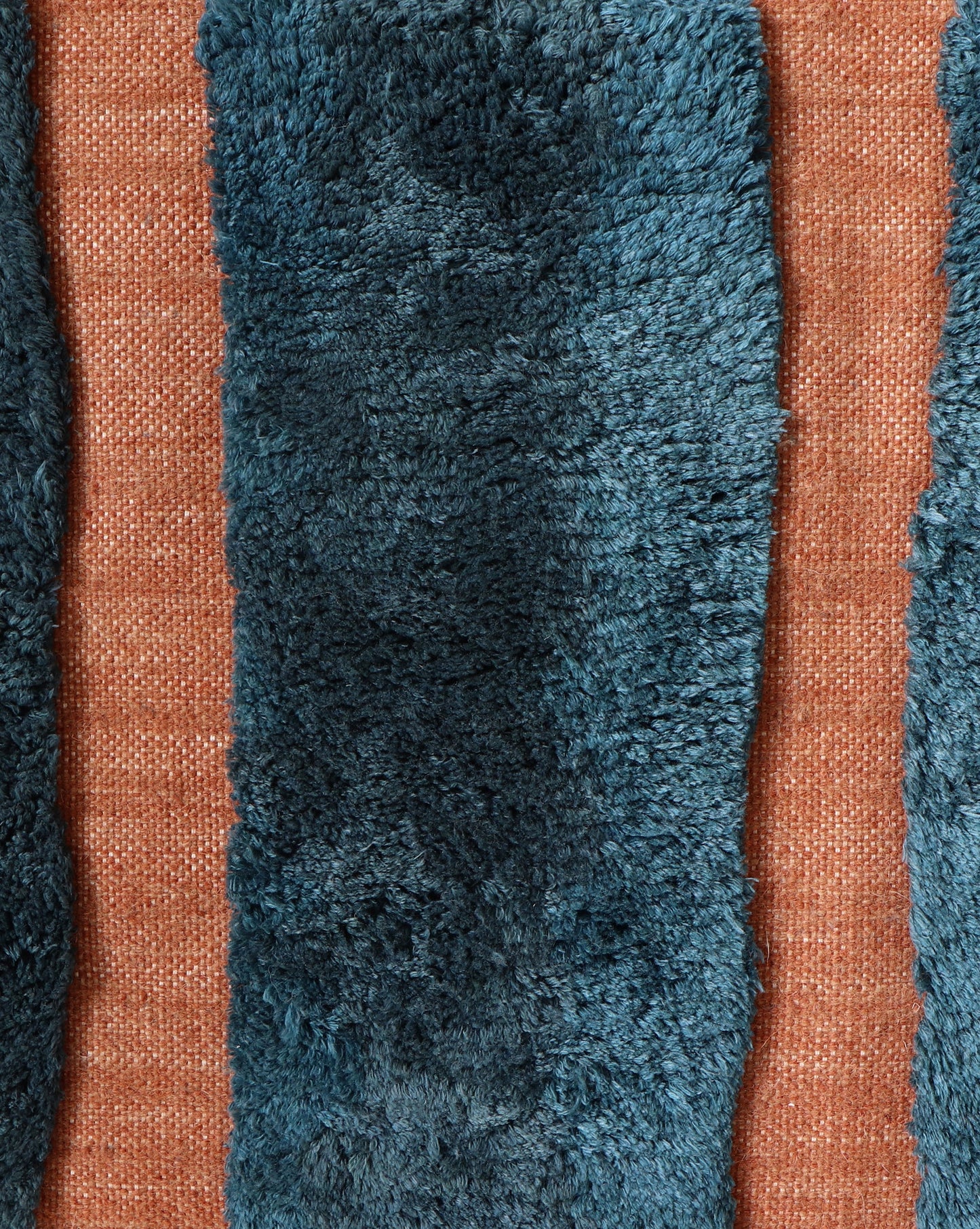 A blue and orange Bold Stripe Hand Knotted Rug Isthmus with high-pile blue stripes