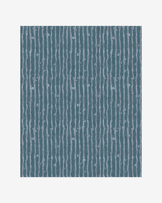 An image of the Drippy Stripe Hand Knotted Rug Gulf with an aquatic feeling