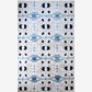 A Galileo Glass Hand Knotted Rug Slate with black and white dots on it