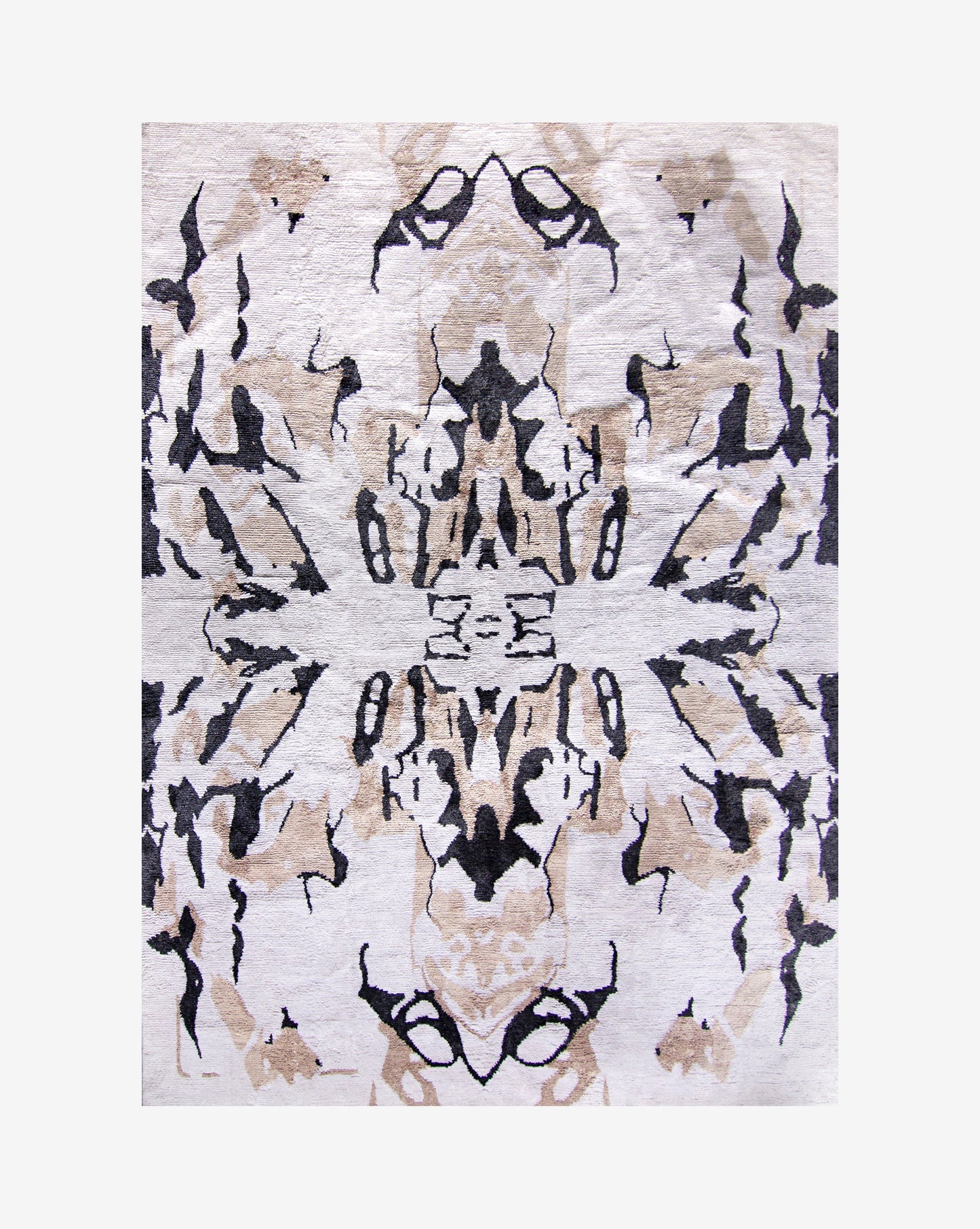 A Mamoun Hand Knotted Rug Neutral with symmetrical abstract designs on it