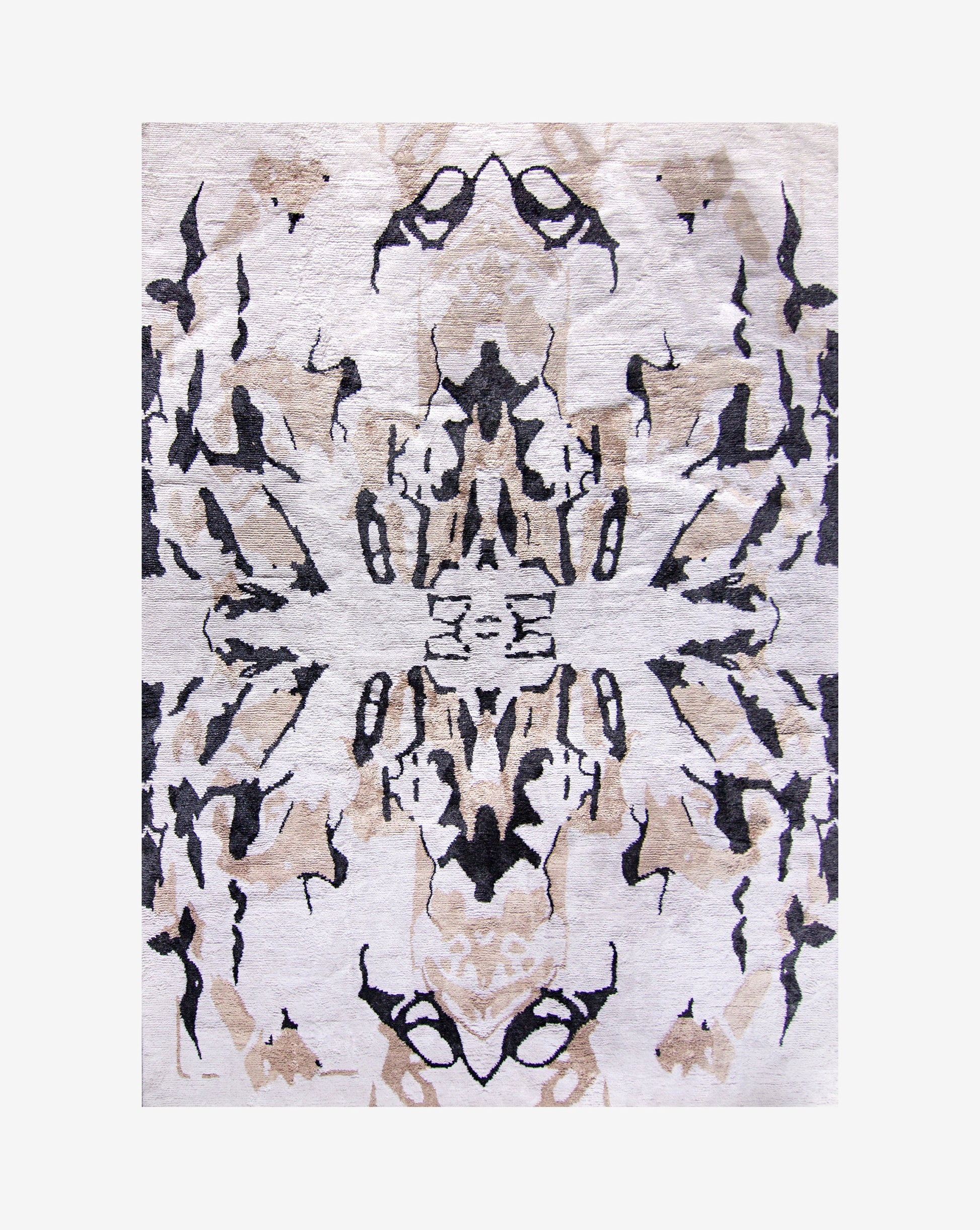 A Mamoun Hand Knotted Rug Neutral with symmetrical abstract designs on it