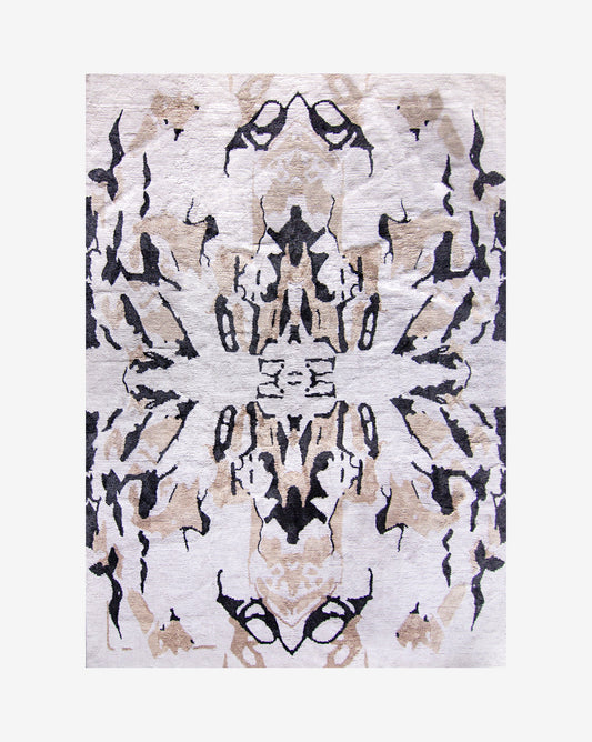 A Mamoun Hand Knotted Rug Neutral with symmetrical abstract designs on it
