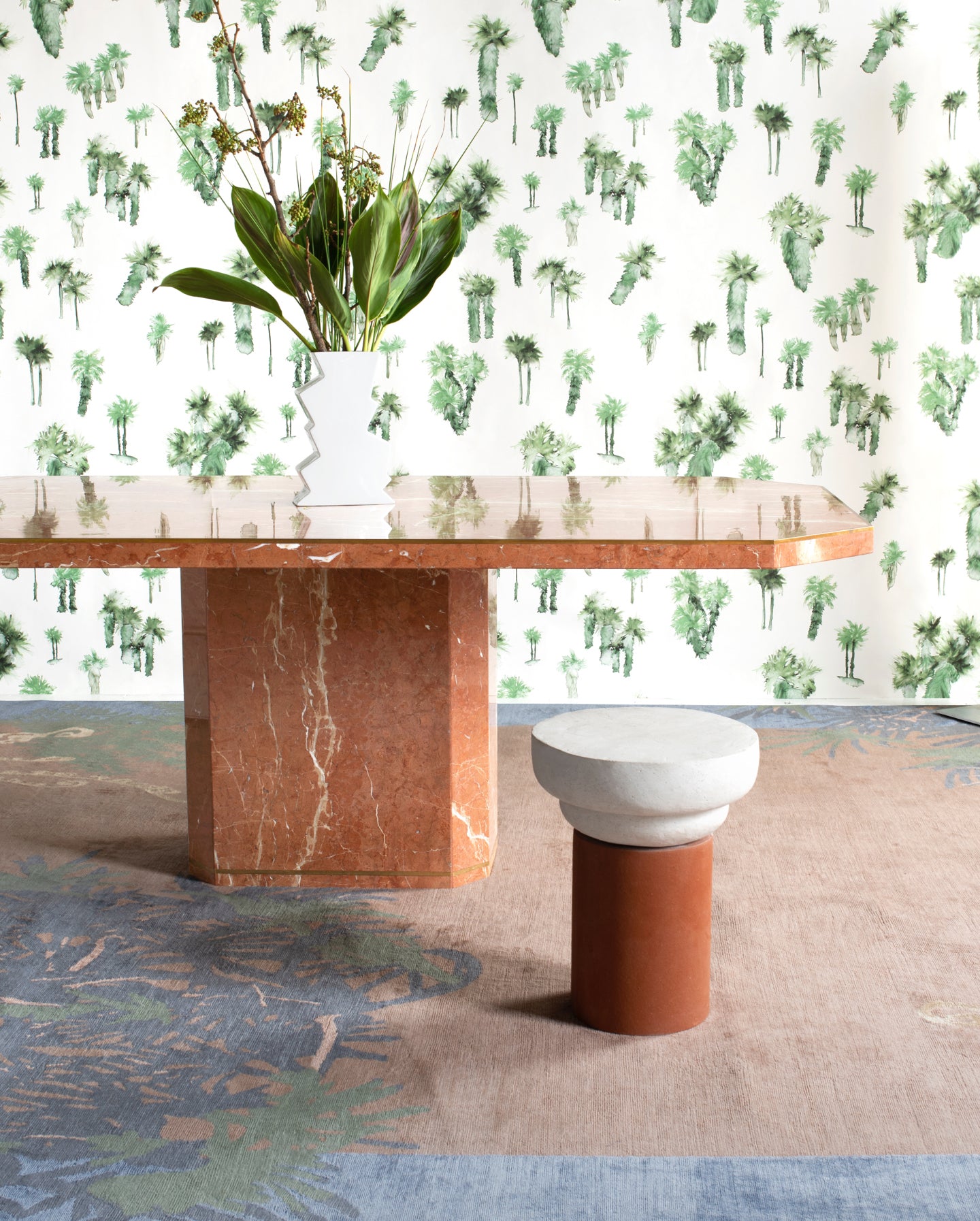 A table with a palm tree wallpaper