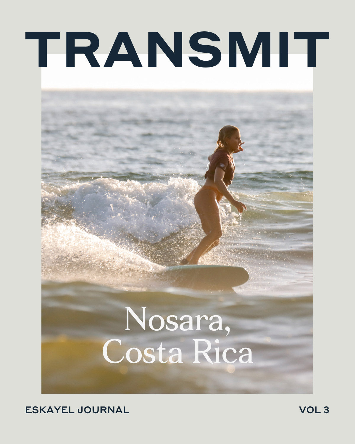 A woman is riding a surfboard on the cover of transmist in Costa Rica