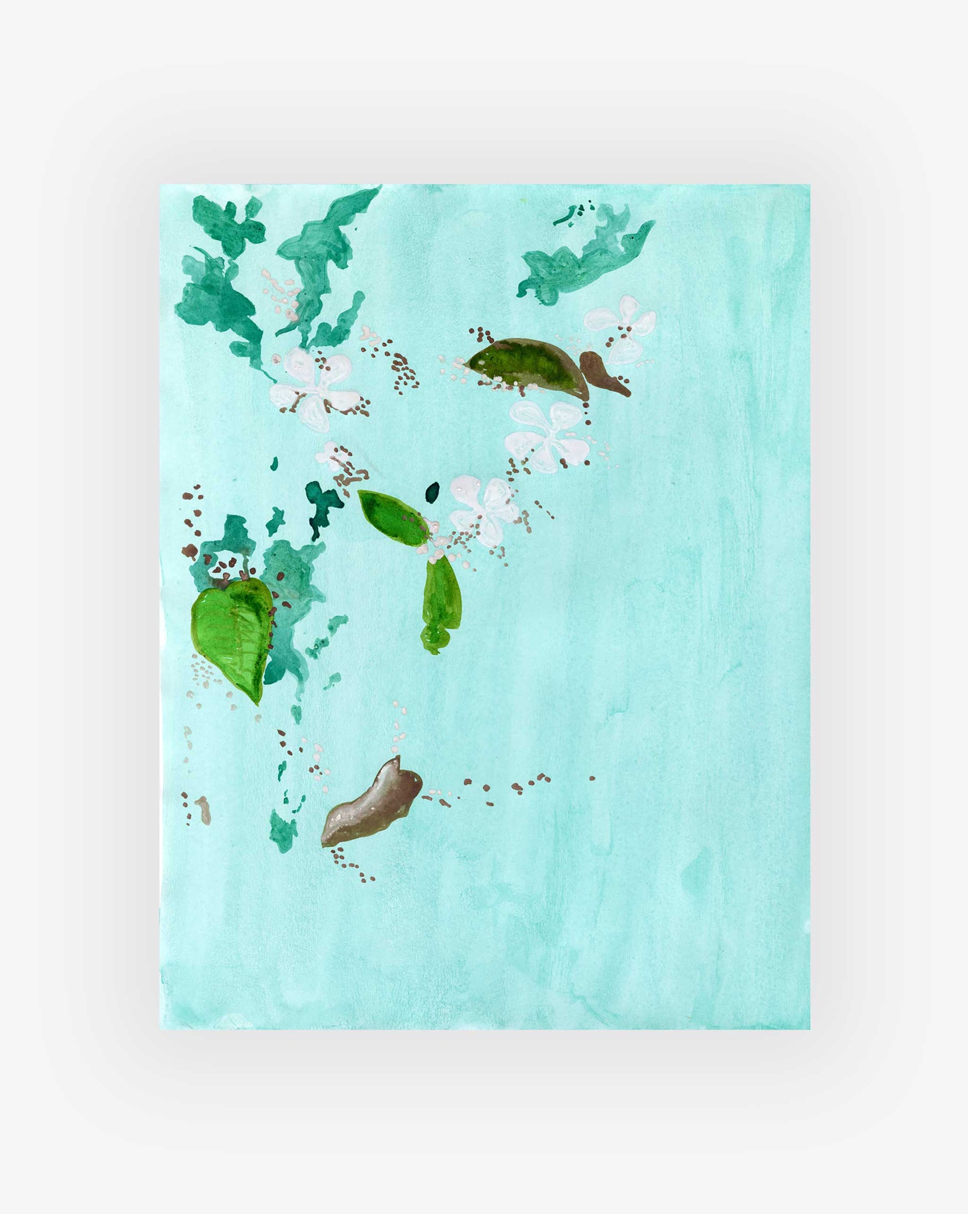 Foliage and flowers floating on a light blue background. 