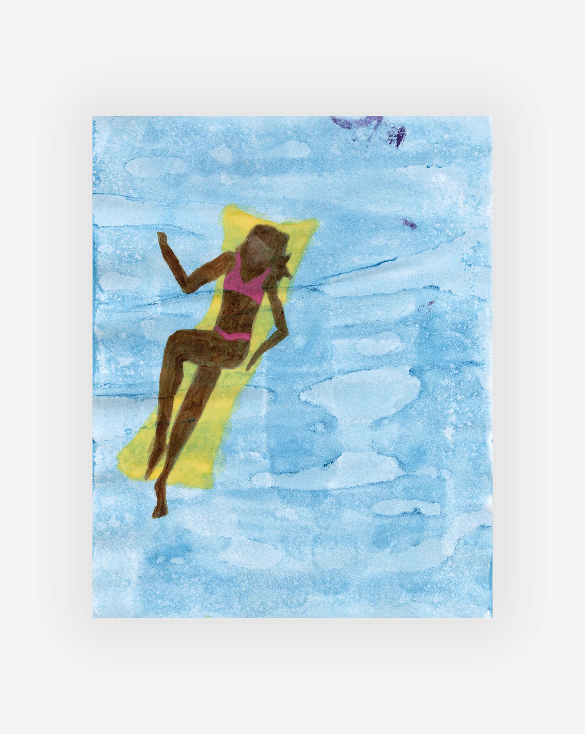 Person floating on a Yellow Raft Print in a blue body of water, wearing a pink swimsuit, reminiscent of an Eskayel design by artist Shanan Campanaro.