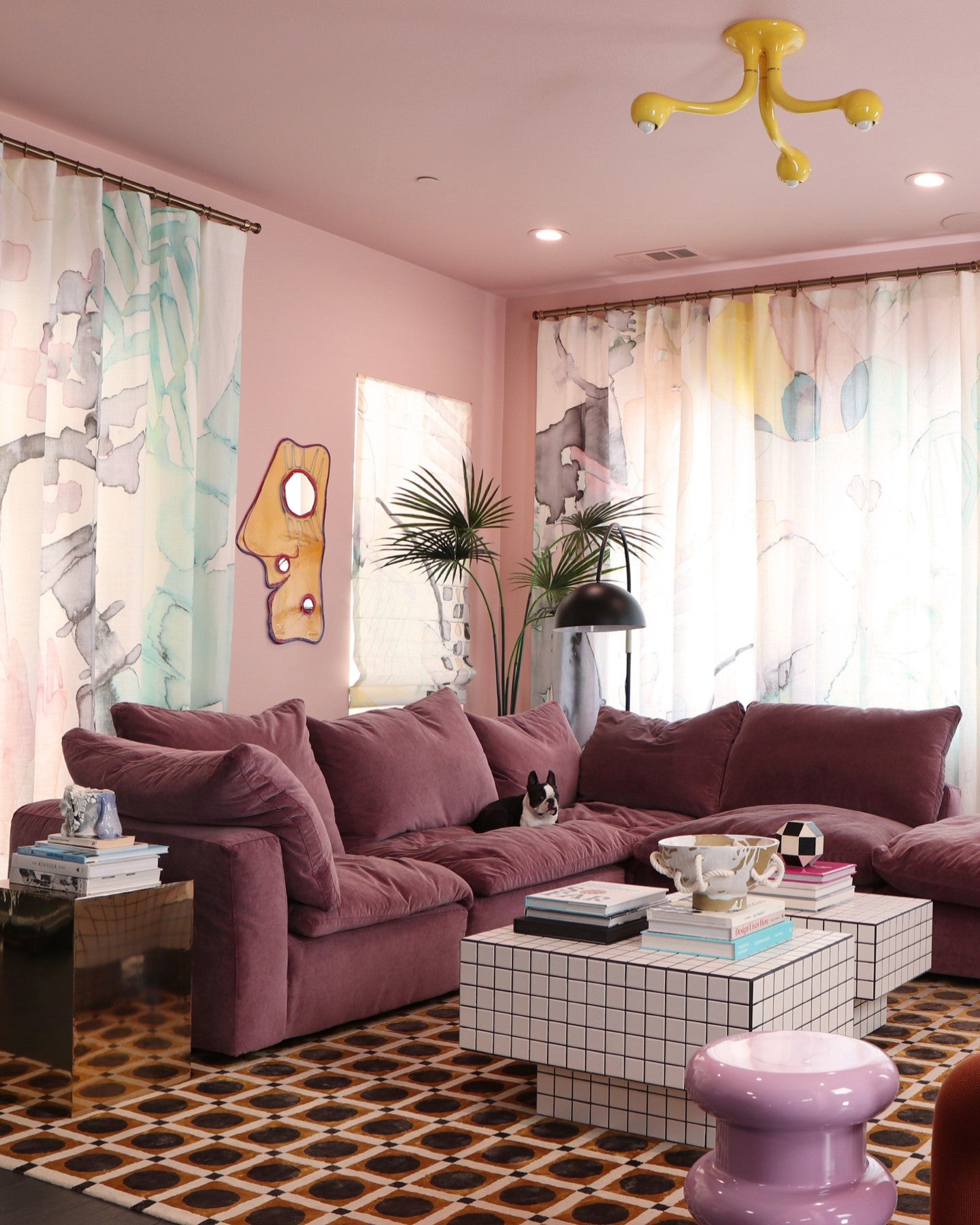 A pink couch in a living room