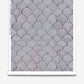 In Baby Scallops custom wallpaper in Pomegranate, tones ranging from mauve to blue create a pattern of overlapping curves.