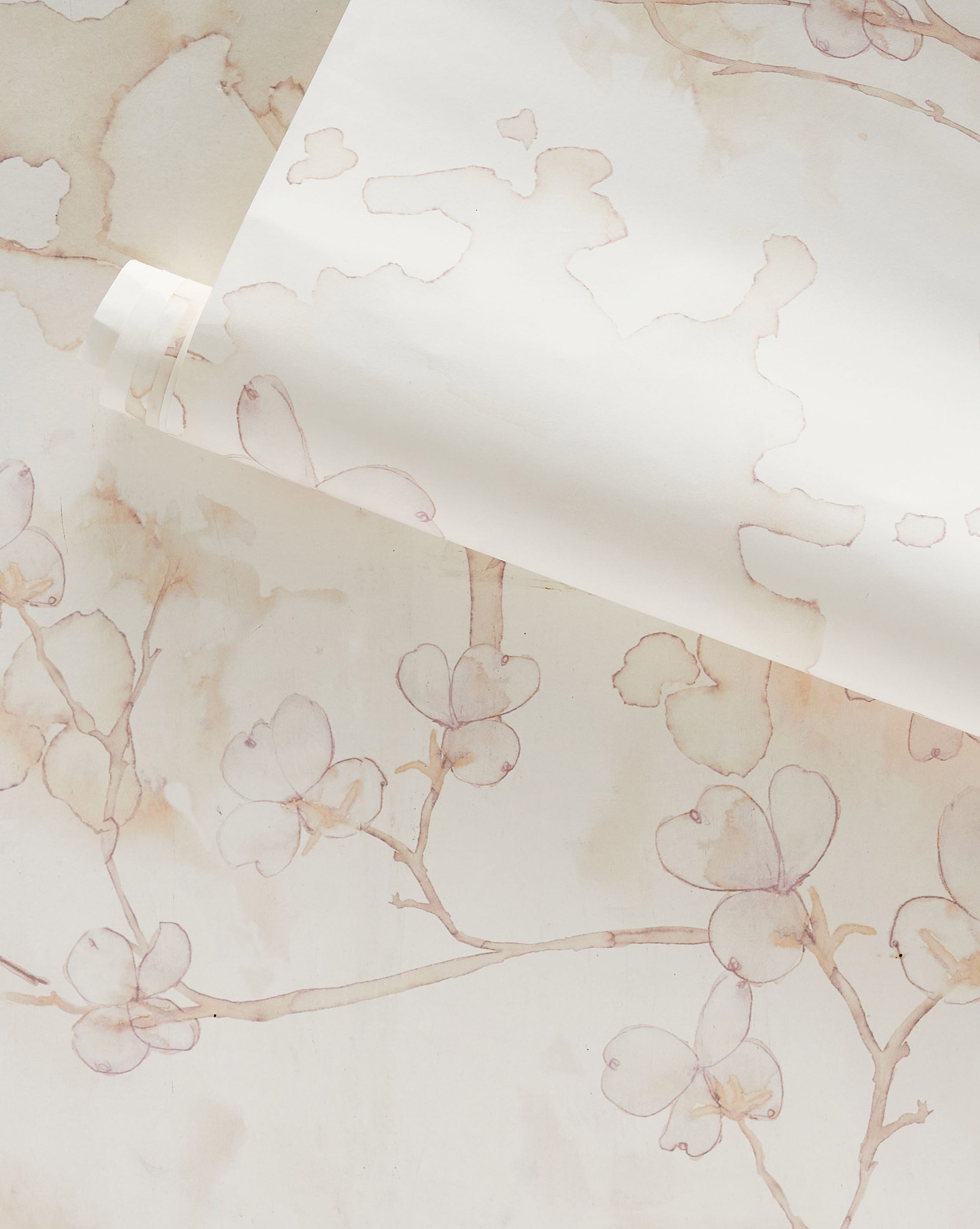 A white custom luxury Dogwood Dreams Wallpaper with pink flowers on it in the Flax colorway