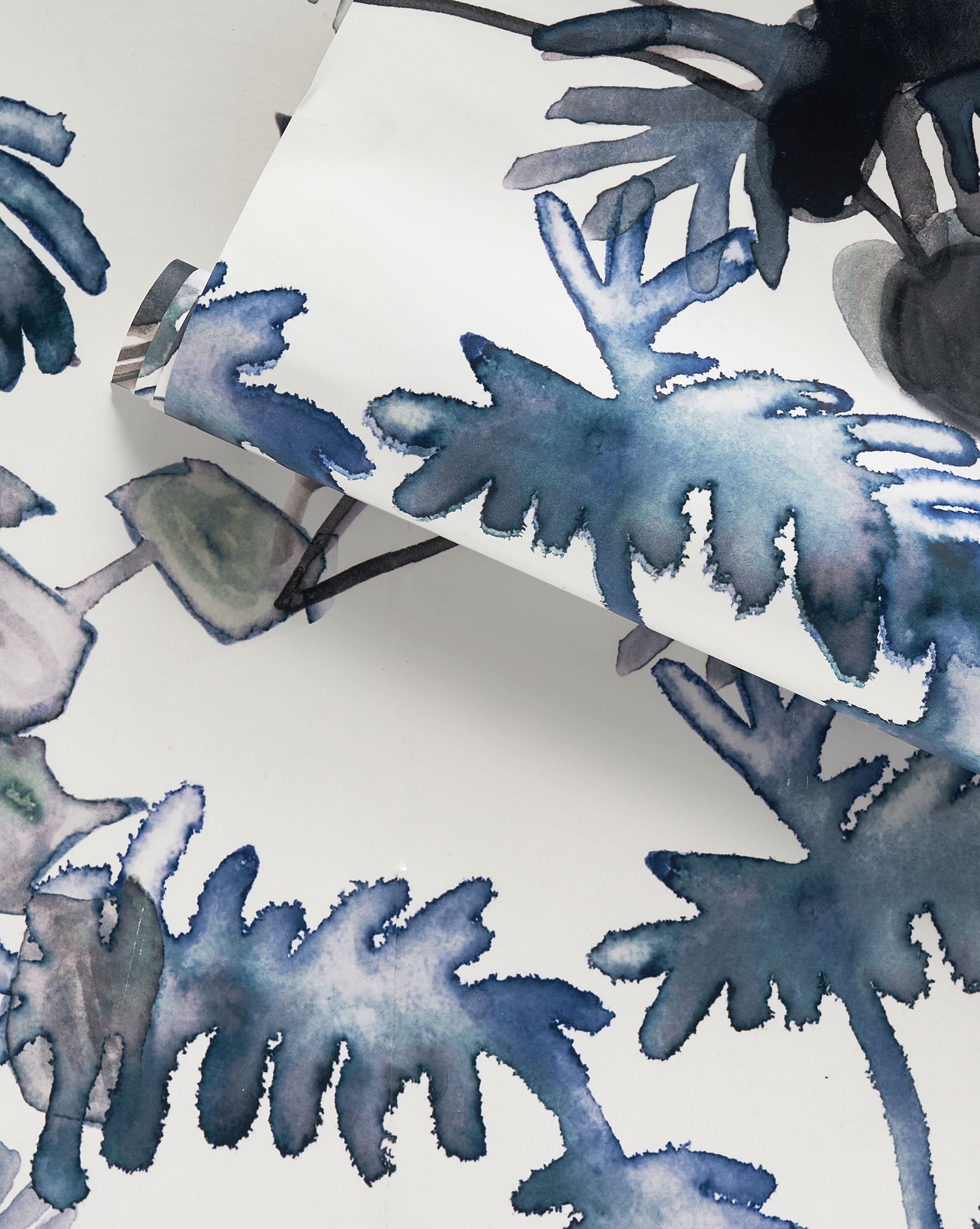 A Topiary Wallpaper Indigo with a watercolor design on it