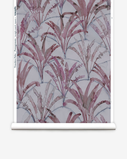 Travelers Palm shows trees repeated over a background of overlapped scallops In Pomegranate, the colorway is magenta and light grey