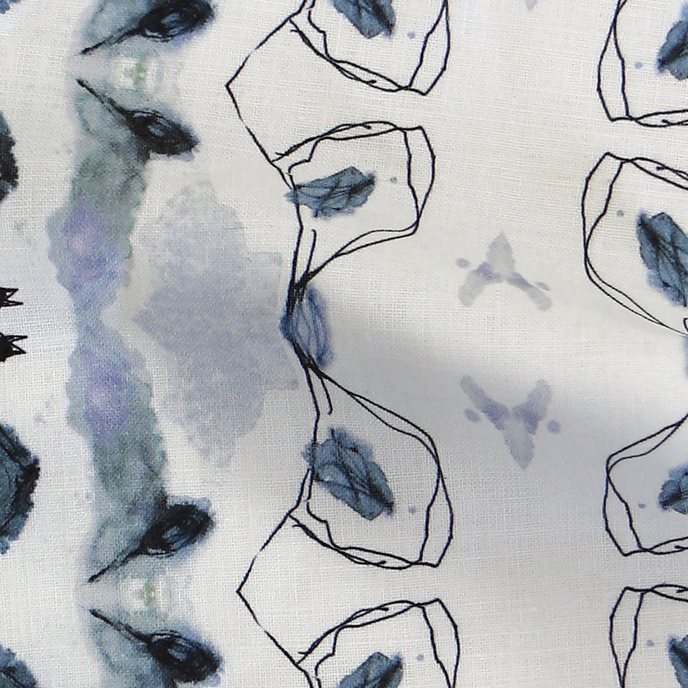 A blue and white fabric with birds