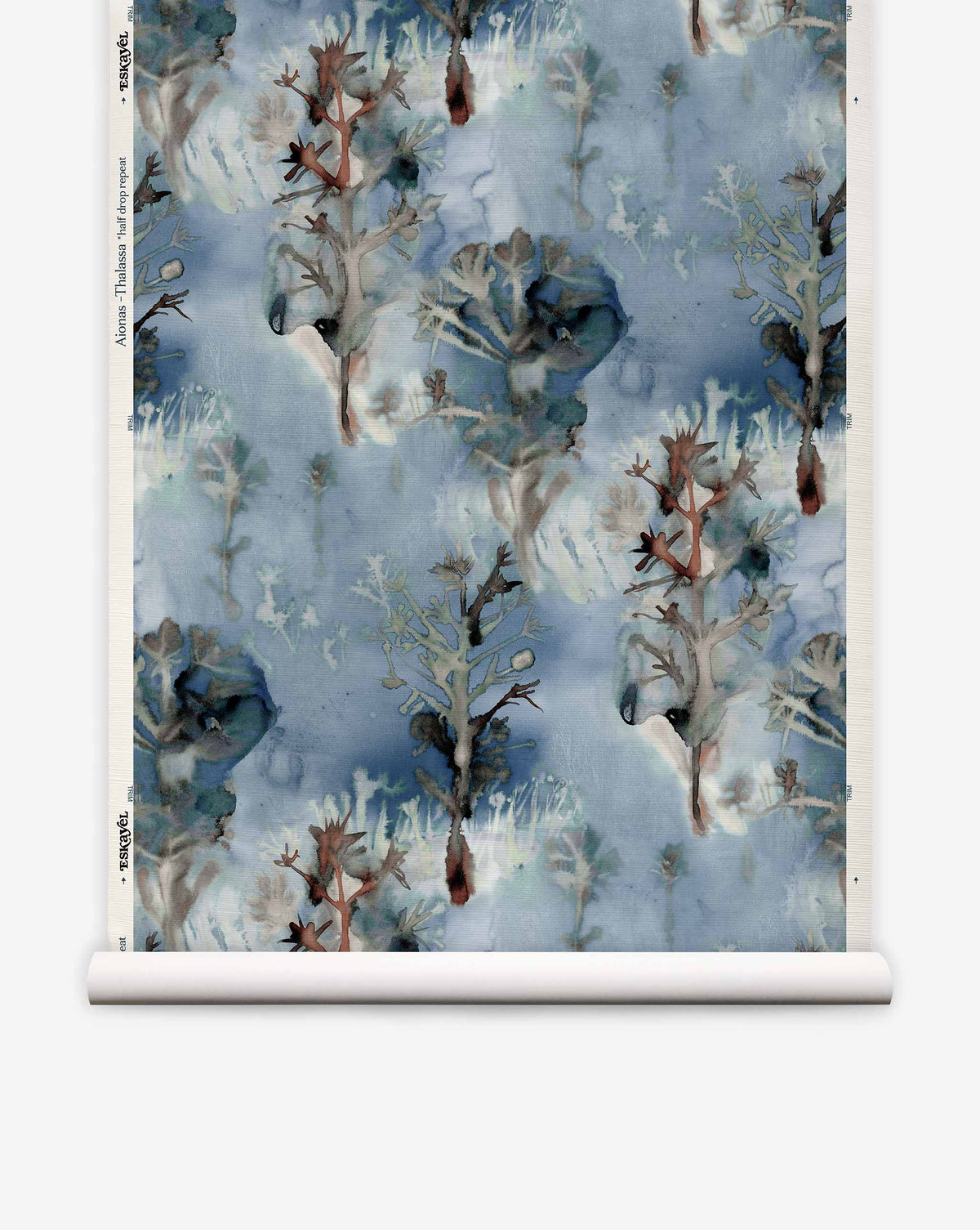Aionas Grasscloth wallpaper roll in Thalassa featuring a blue watercolor pattern of stylized trees and abstract foliage.
