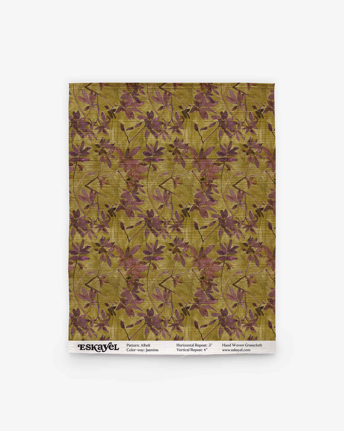 Alhelí Grasscloth||Jasmine wallpaper sample with a repeating pattern of dark purple leaves on a textured, biophilic grasscloth background, featuring a label with details at the bottom.