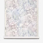 A roll of eco-friendly Aquarelle Grasscloth||Ice wallpaper featuring an abstract, crackled pattern of light blue and grey shapes.