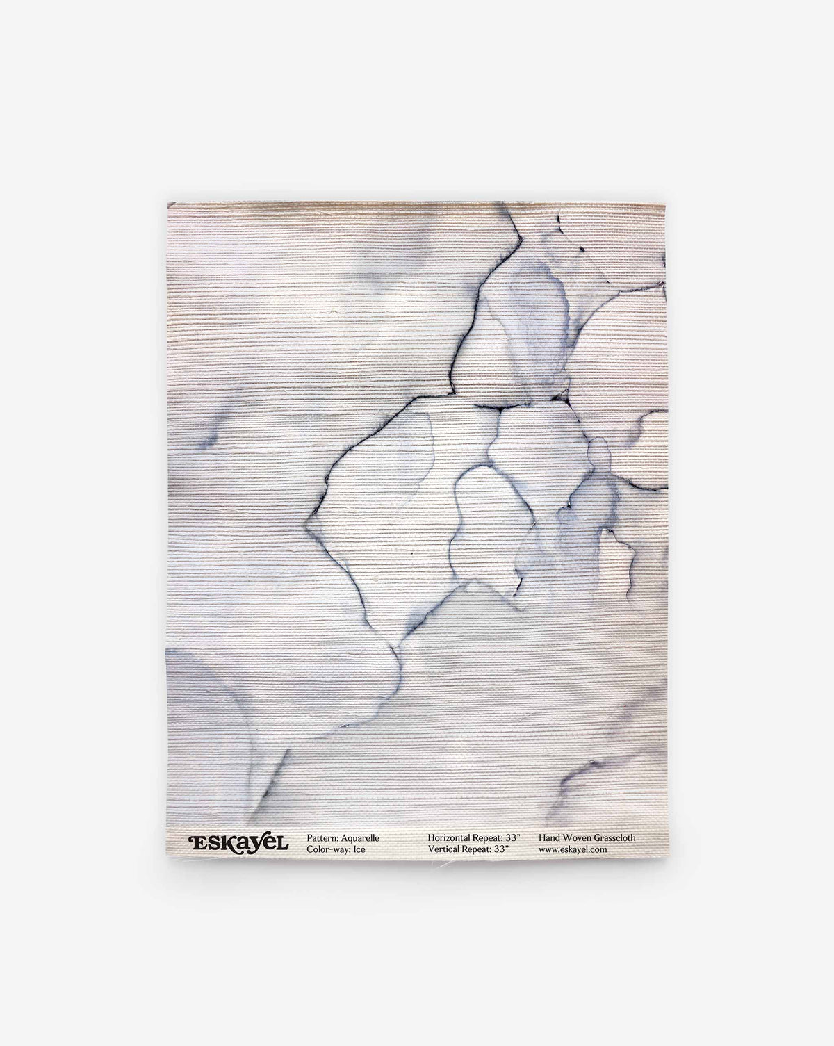 A rectangular Aquarelle Grasscloth Sample in Ice, featuring a white, horizontal grasscloth texture with a watercolor-style blue and black marble pattern.