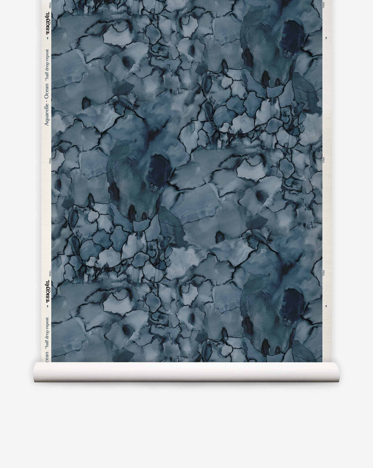 Roll of Aquarelle Grasscloth||Ocean eco-friendly watercolor wallpaper with an abstract blue and grey pattern and a cracked, stone-like texture.