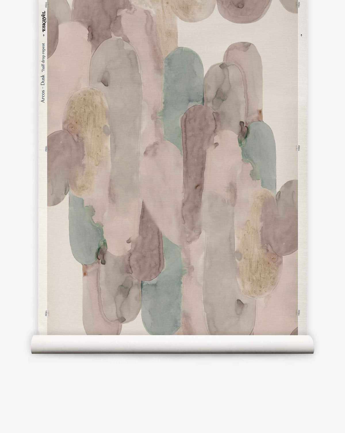 Arcos Silk Wallcovering||Dusk features abstract watercolor designs with overlapping oval shapes in muted tones of beige, pink, taupe, and blue. Displayed on a white roll against a plain background, this hand-painted wallpaper embodies artisanal charm and subtle sophistication—ideal for modern interiors.
