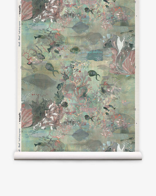 Atoll Grasscloth||Reef is a roll of grasscloth wallpaper that showcases an elegant ocean-inspired design, featuring watercolor-style fish, seaweed, and coral in muted pastel colors.
