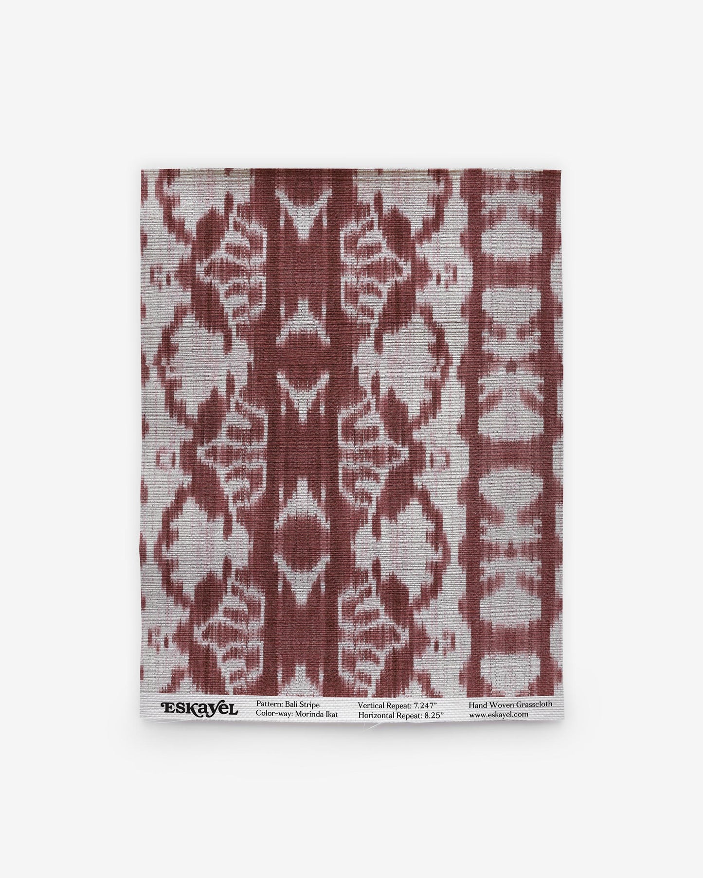 A high-end Bali Stripe Grasscloth 15'ft Single Roll Morinda Ikat pattern in red and white on wallpaper