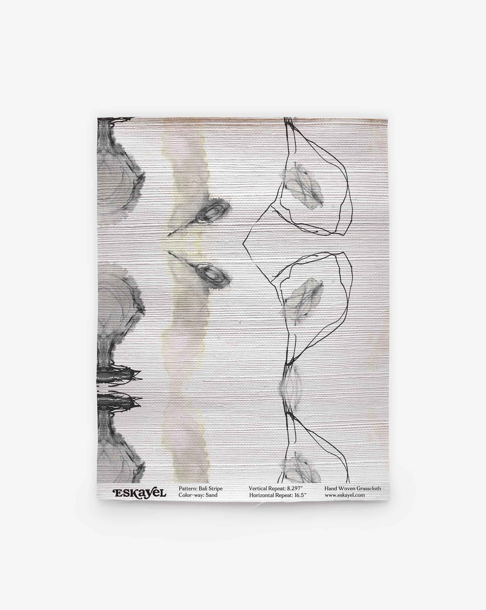 A handwoven Bali Stripe Grasscloth||Sand rug showcases an abstract design with black line and gray watercolor patterns on a light background, accented by subtle brown and tan tones, evoking the ambiance of Bali; shown flat with product details printed at the bottom.