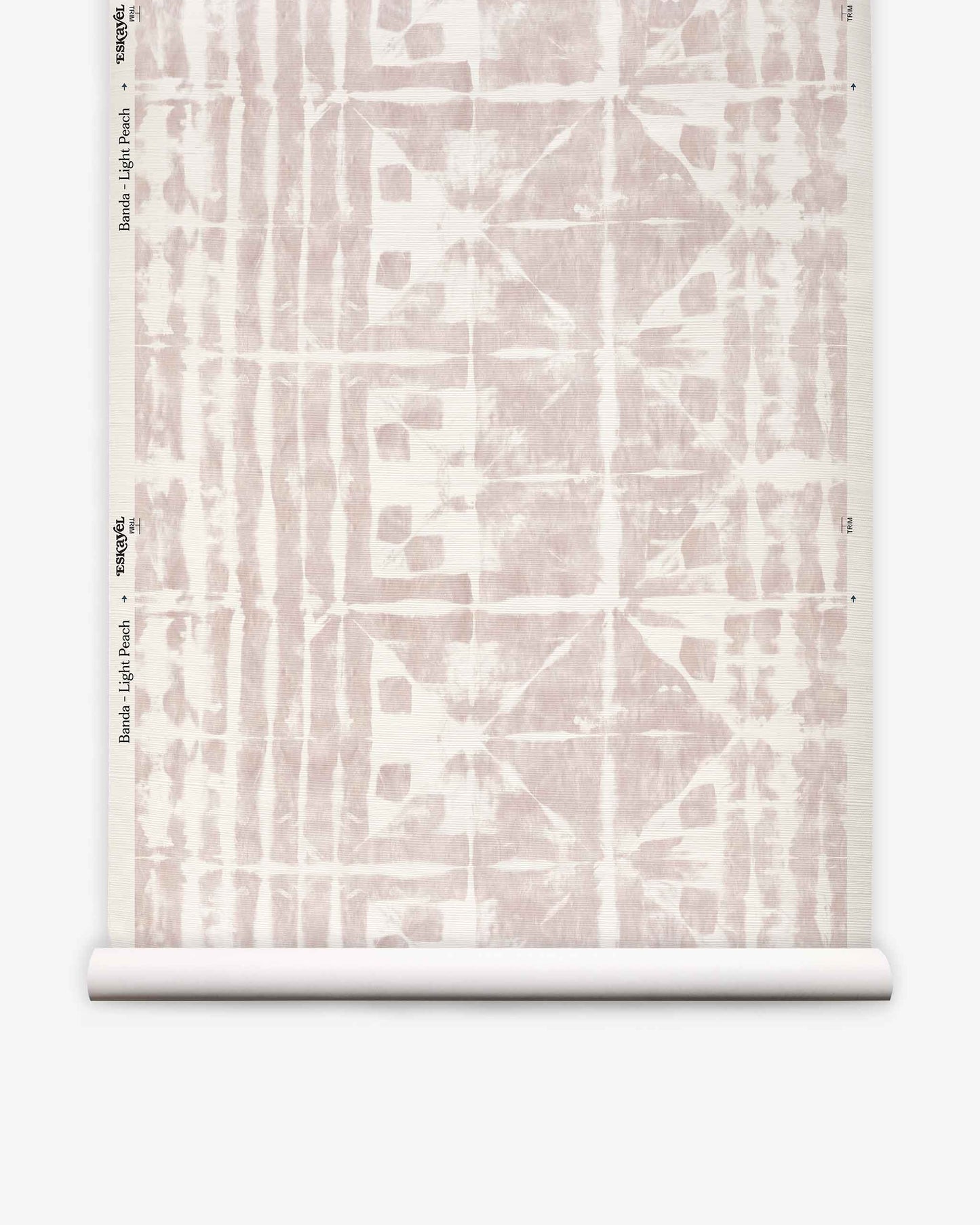 A roll of Banda Grasscloth||Light Peach custom wallpaper featuring a light peach abstract geometric pattern on a white background, displayed vertically against a white surface.