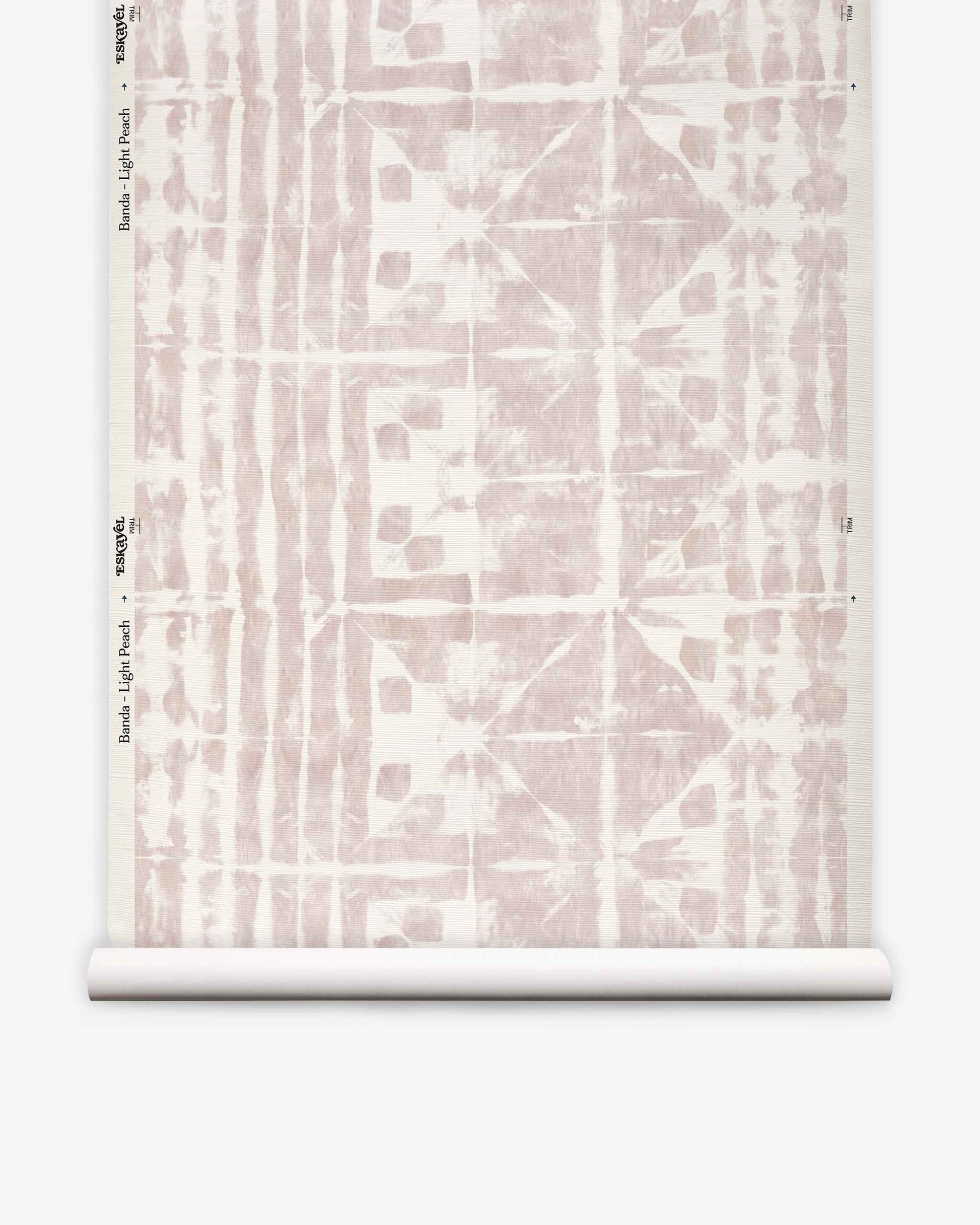 A roll of Banda Grasscloth||Light Peach custom wallpaper featuring a light peach abstract geometric pattern on a white background, displayed vertically against a white surface.