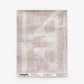 A rectangular sample of Banda Grasscloth||Light Peach features a pale, abstract pattern in soft peach tones reminiscent of shibori tie-dye. Labeled “Eskayel” at the bottom with design and weave details, it offers perfect inspiration for custom wallpaper or luxury grasscloth wallpaper designs.