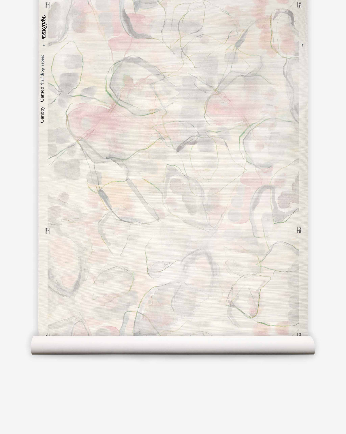 Canopy Grasscloth in Cameo features a luxury sisal texture with a faint, repeating pattern of soft pink and grey watercolor leaves with thin green outlines on a cream-colored background.