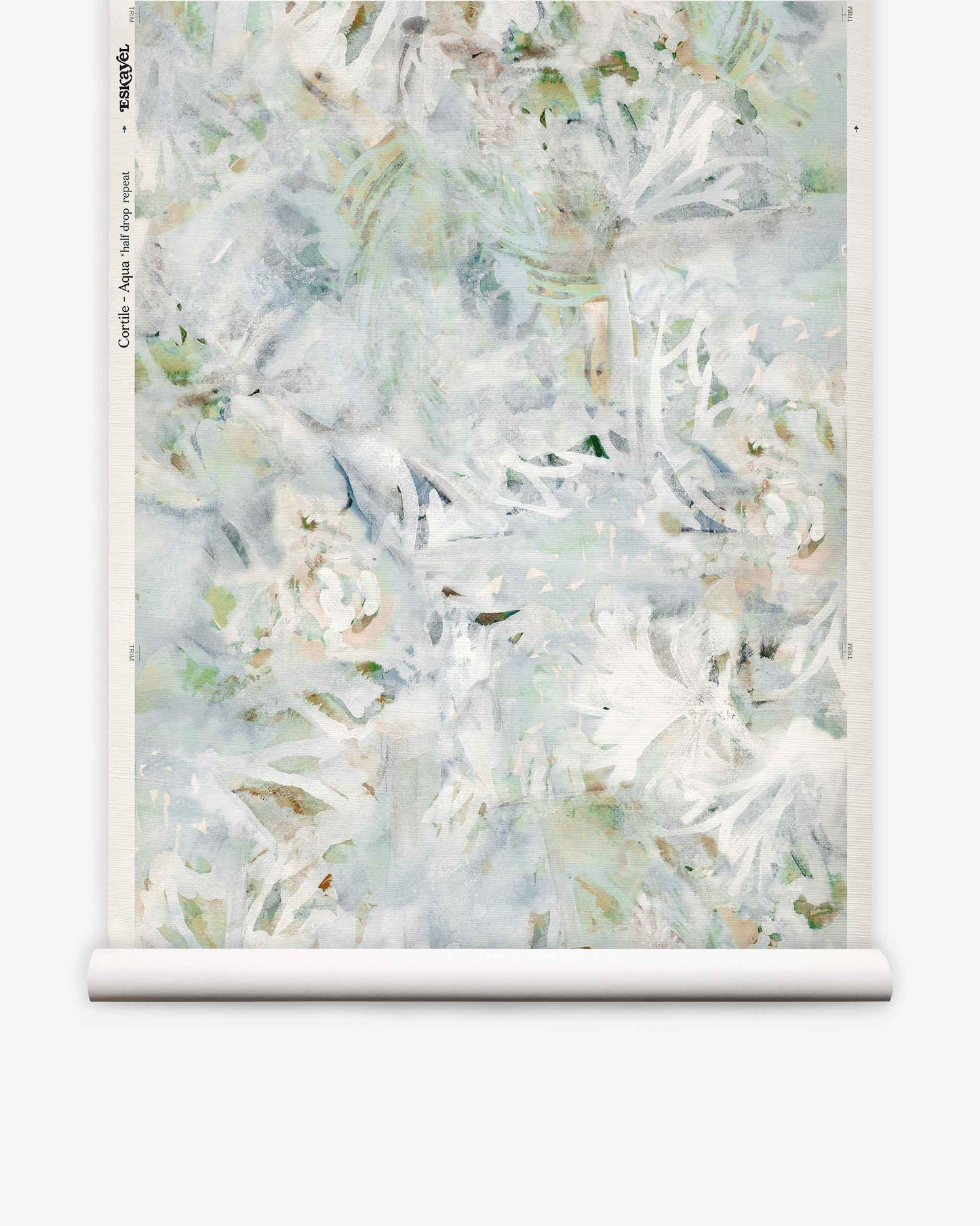A roll of Cortile Grasscloth||Aqua wallpaper featuring a light abstract floral pattern with watercolor-like shades of white, grey, and soft green on a white background.